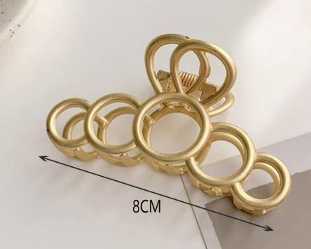 PINZA DE CABELLO DORADA 8CM